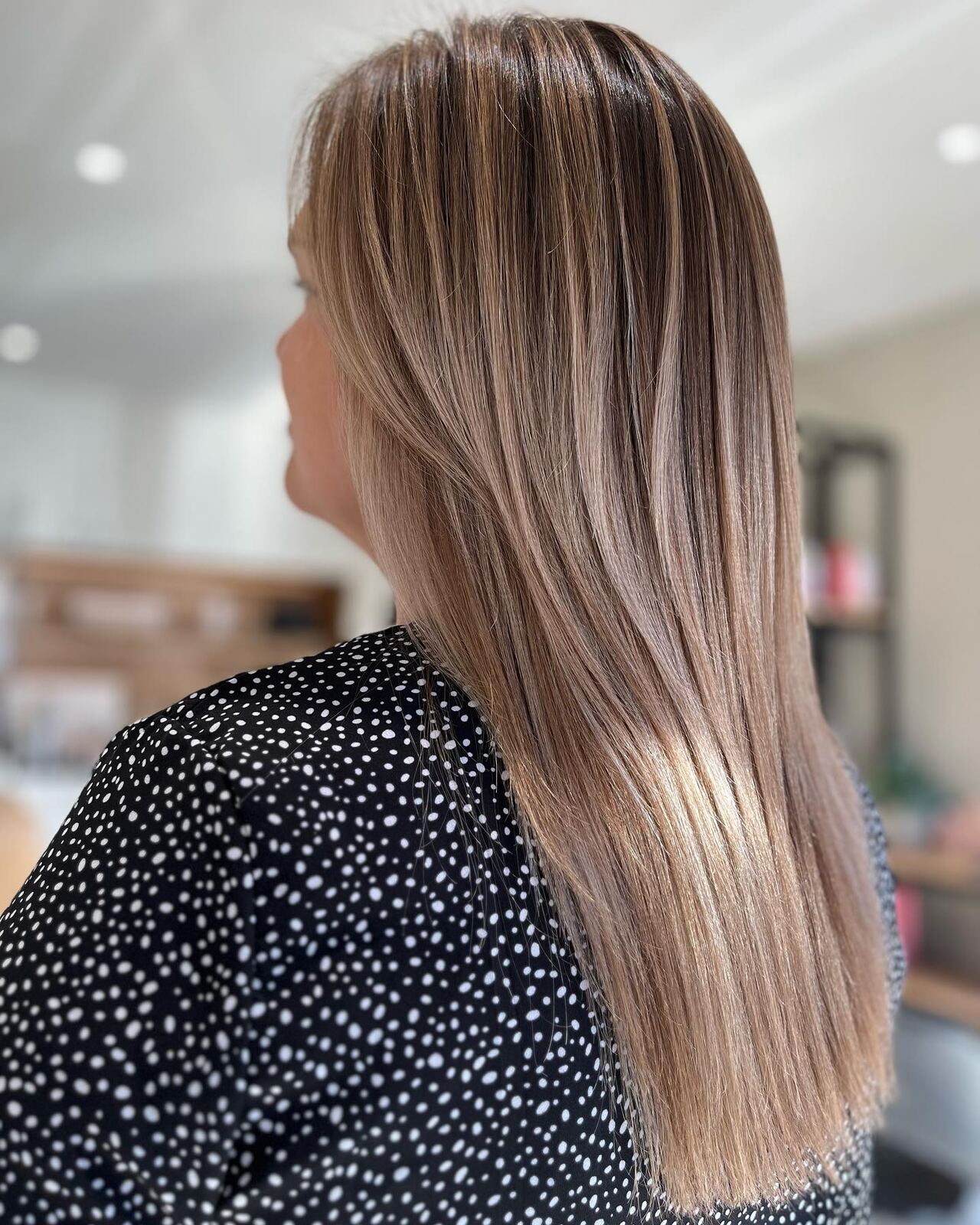 Lang glanzend haar met subtiele balayage
